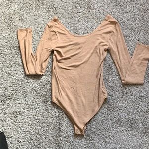 Tan body suit